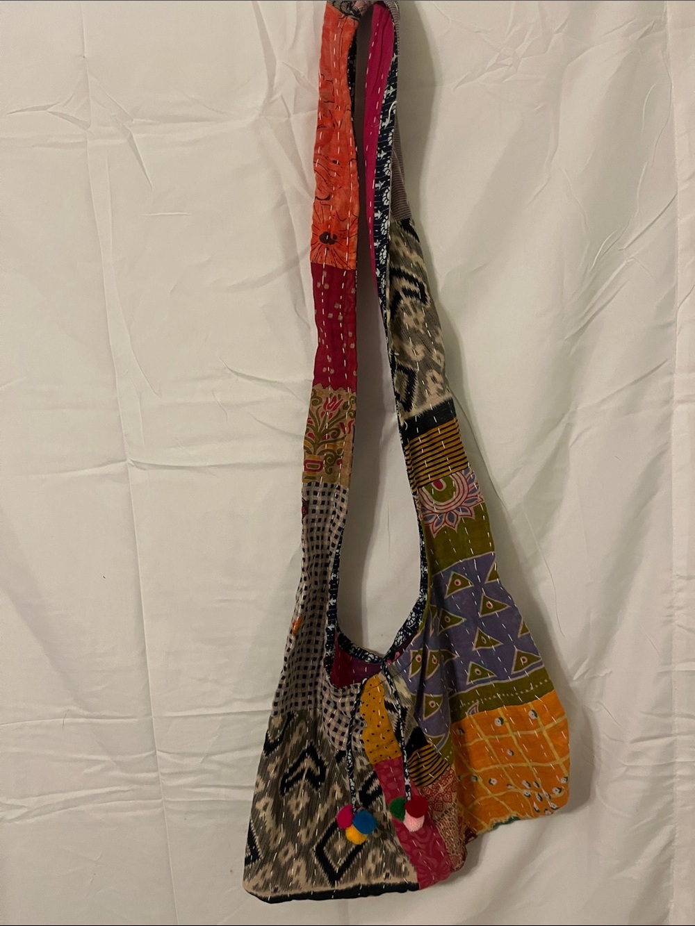 Multicolor Patchwork Shoulder Bag with Pom Tassels